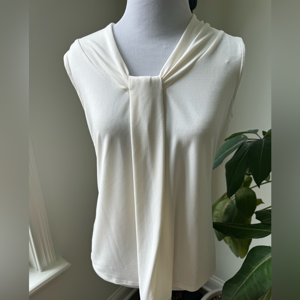 NWOT Chico’s size 0 small ivory stretch top